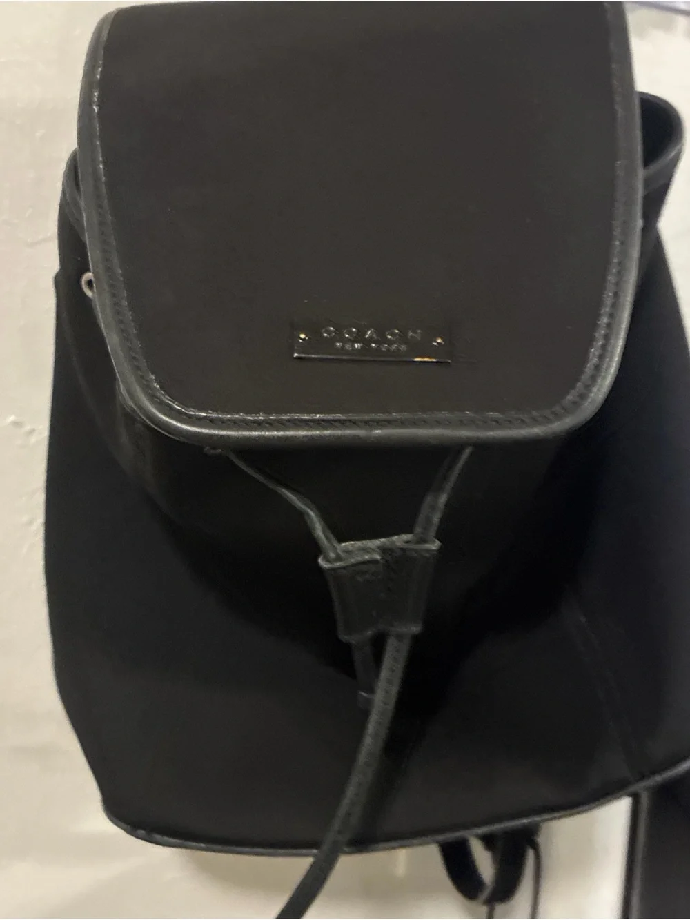 Coach Black Leather Drawstring Flap Backpack